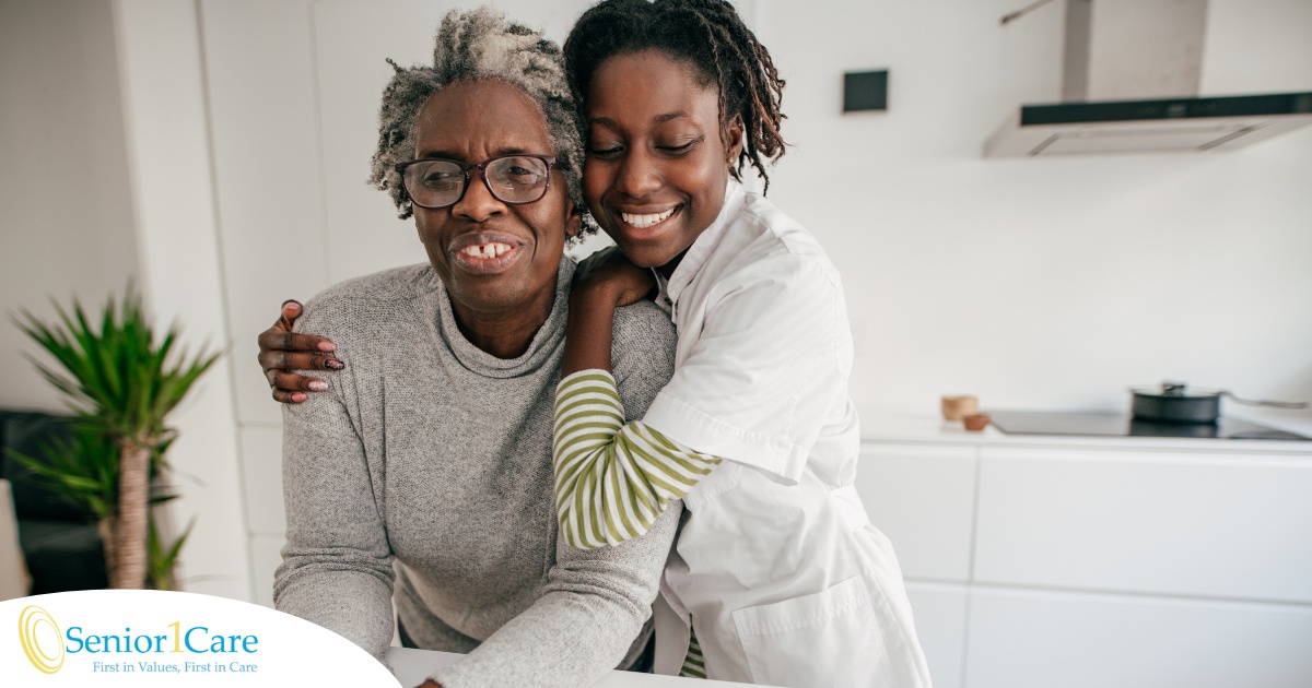 A caregiver hugs a client, representing the science of caregiving and how latest research can help provide quality care.