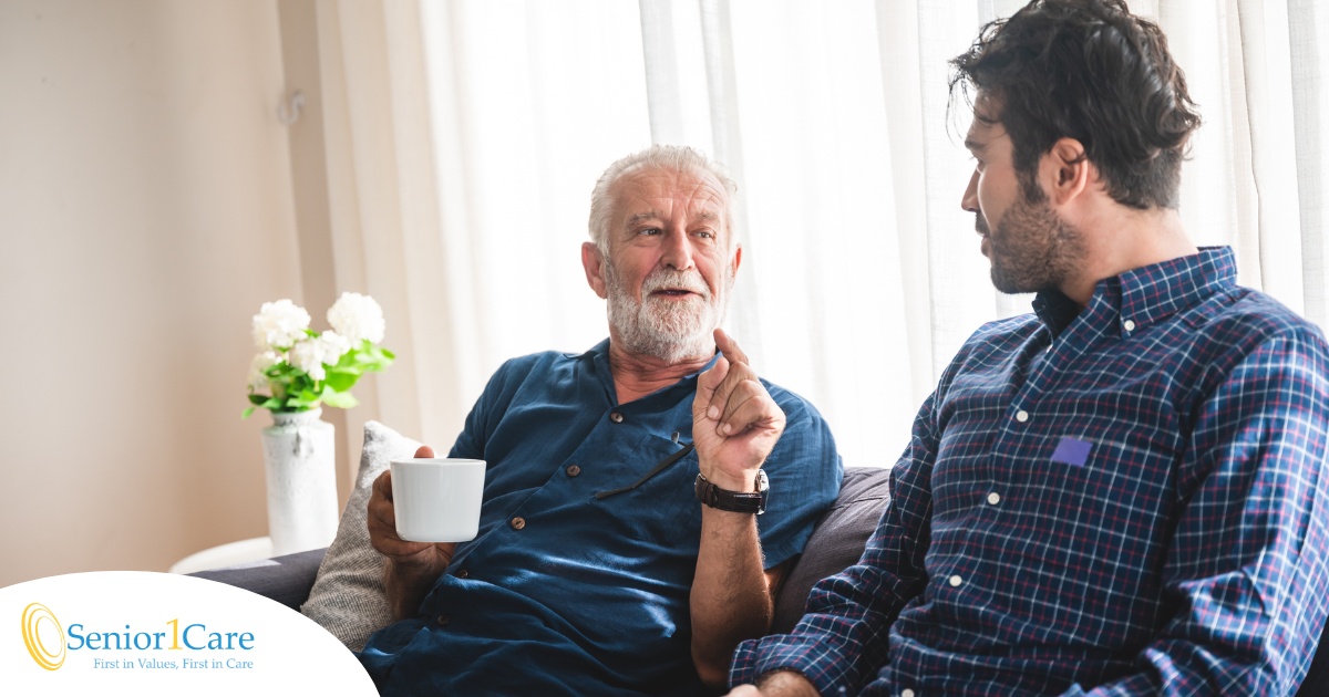 A son talks with an older parent representing the kind of communication needed to tell how aging parents are doing.